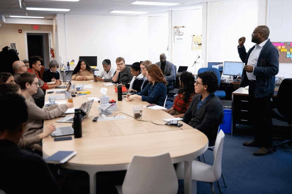 Several people in an office meeting