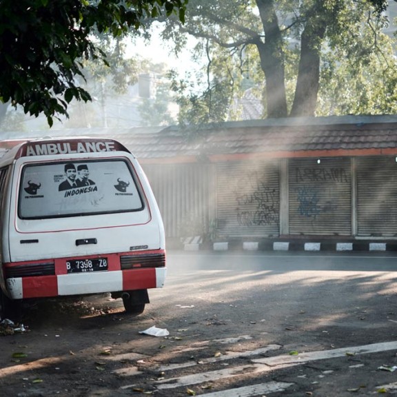ambulance parlked in street corner
