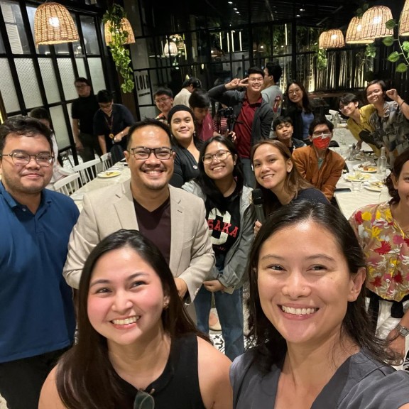 Journalists smile at the 10th Anniversary Party for Solutions Journalism in Manila, Philippines