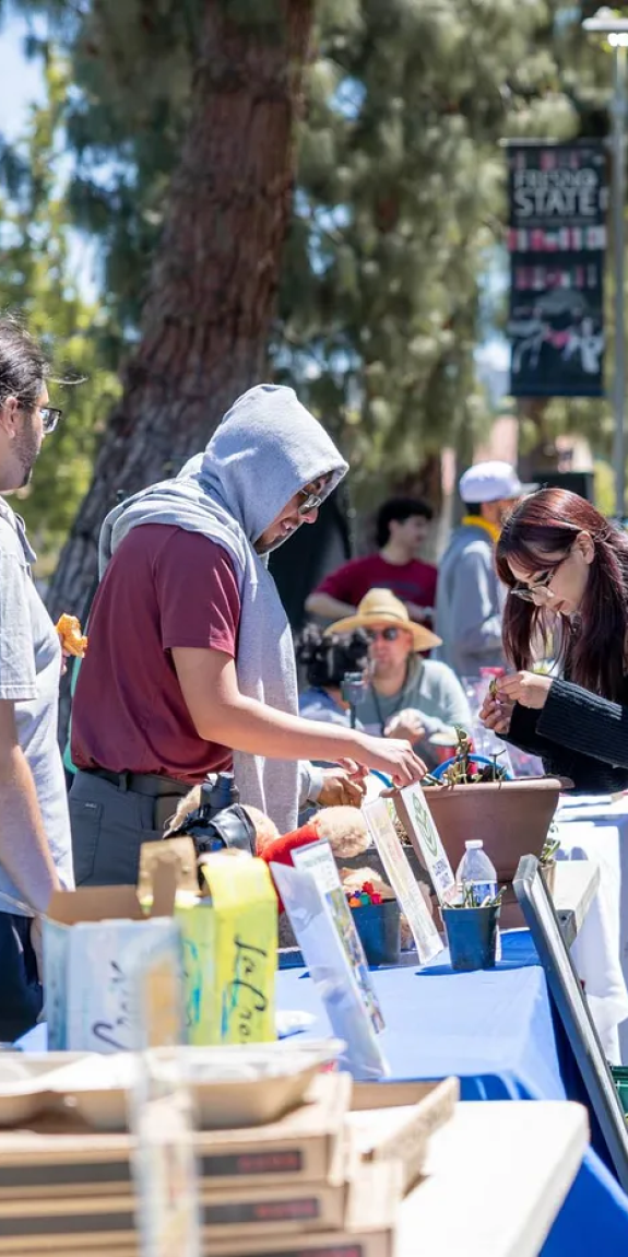 Students talk during a school fair