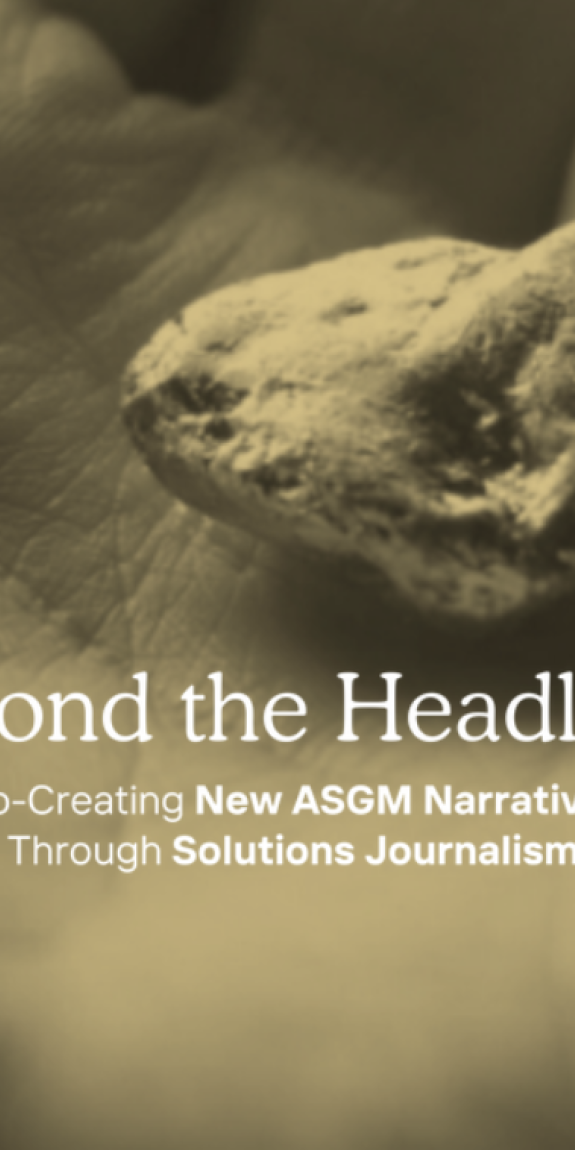 A person holds a gold nugget in their open palm