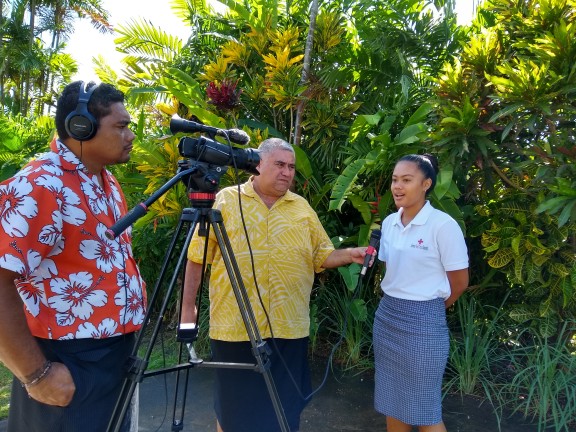 A women is interviewed on camera