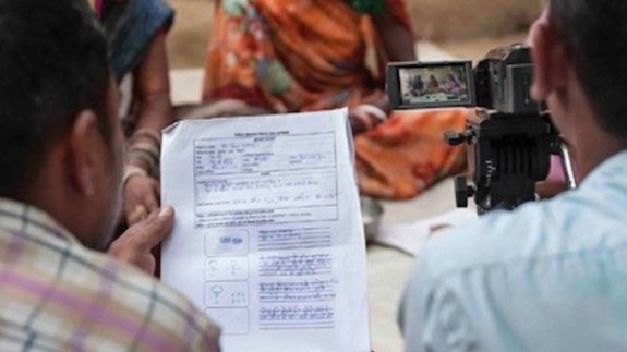 Two people conduct an interview