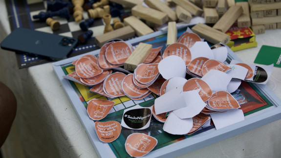 Table with solutions journalism themed stickers scattered across it