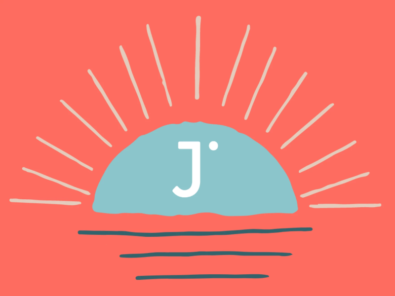 A rising sun has a large J on it