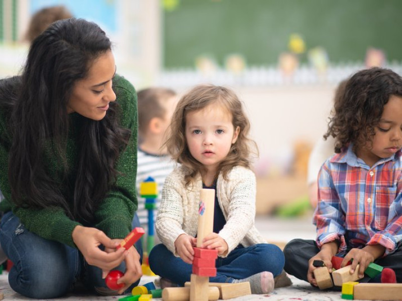 A child plays with blocks