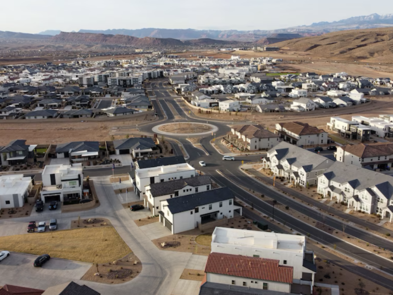 (Jud Burkett | Special to The Tribune) A variety of homes and condominiums in various states of construction near the Arizona-Utah state line in St. George, Thursday, March 20, 2025. A moderate-income housing program is intended to result in more housing options and variety like this neighborhood and more affordability to households earning 80% or less in the state’s biggest cities and counties.