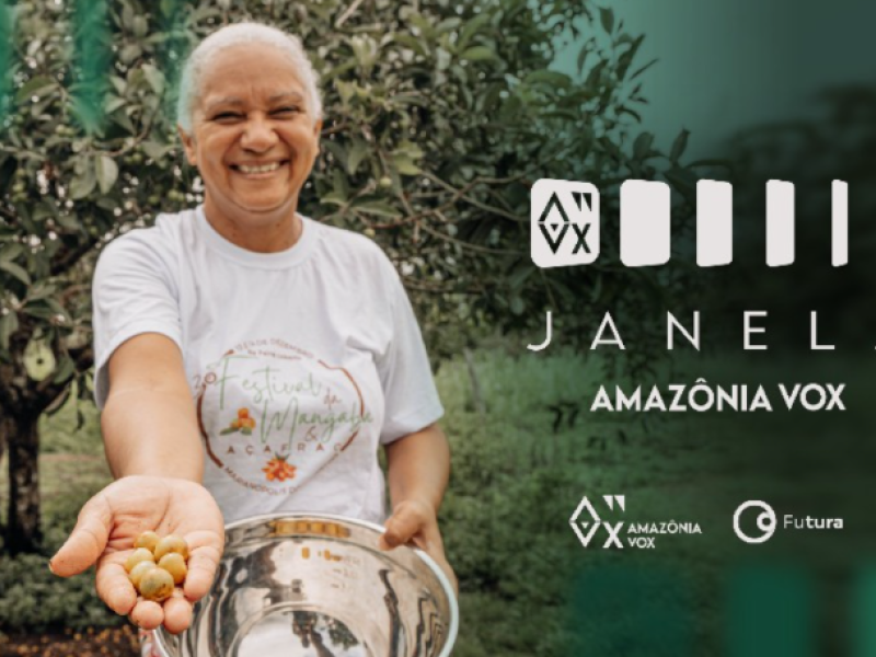 A smiling woman extends her handful of fruit