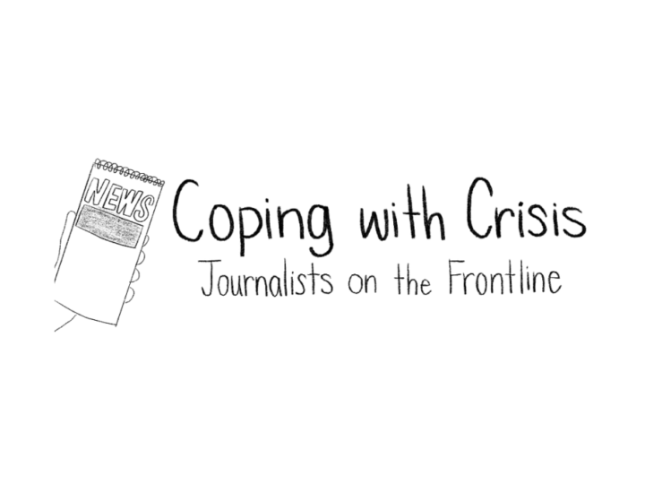 A person holds up a reporter's notebook