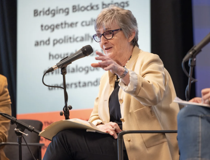 Liza Gross speaks on a panel