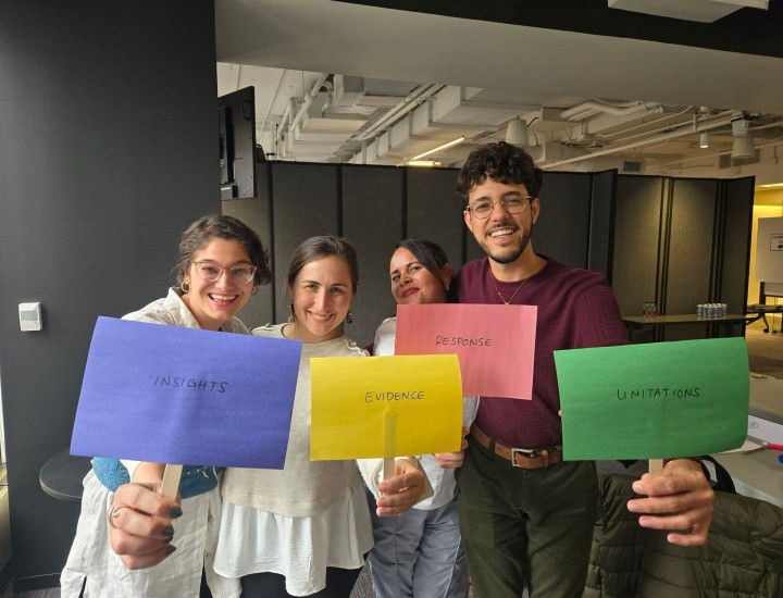 9 Millones staff model with their favorite pillar after THE BEST SOLUTIONS JOURNALISM GAME hosted by Linda at the Revenue Accelerator. Photo by Melissa Casutte