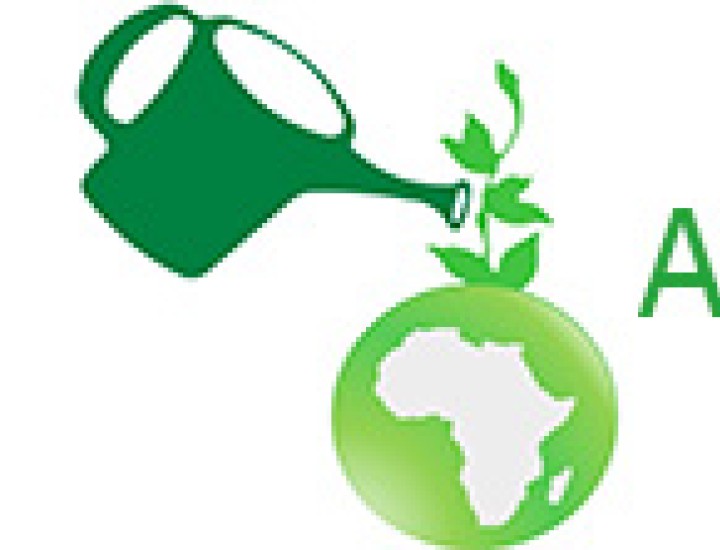 A watering pan waters a globe with an outline of Africa showing