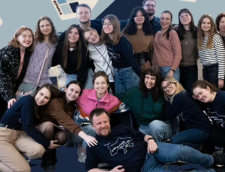 People at Ukrainian news outlet Rubryka gather for a group photo