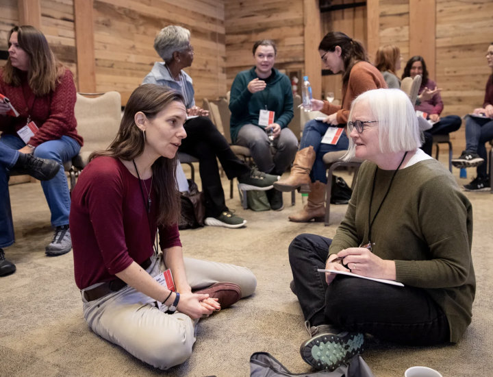 Journalists pair up and speak with each other at the SJN Summit