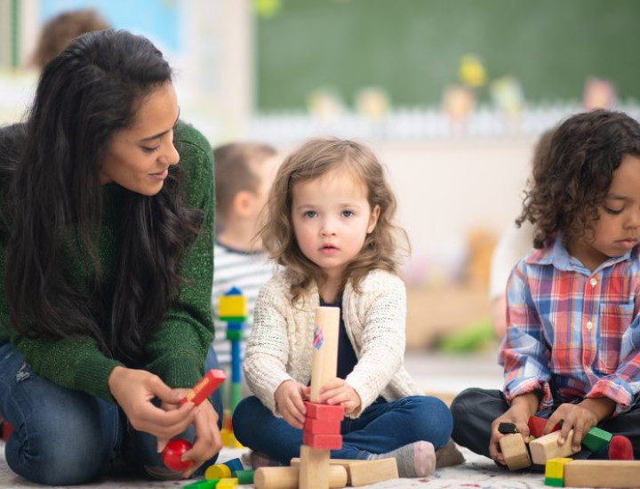 A child plays with blocks