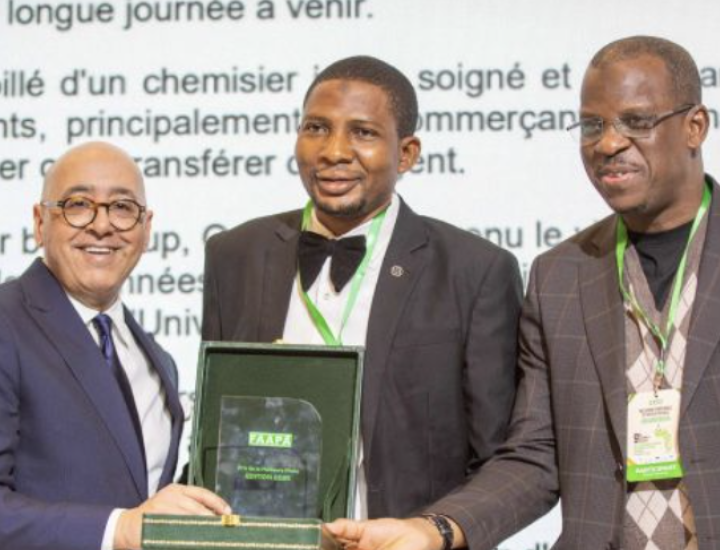 Usman Aliyu receiving the 2025 Award of the Atlantic Federation of African Press Agencies (FAAPA) for Best Feature Article