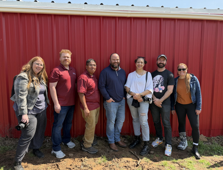 SJN Staff and coaches with the staff of Cherokee Phoenix. Courtesy of Angela K. Evans.